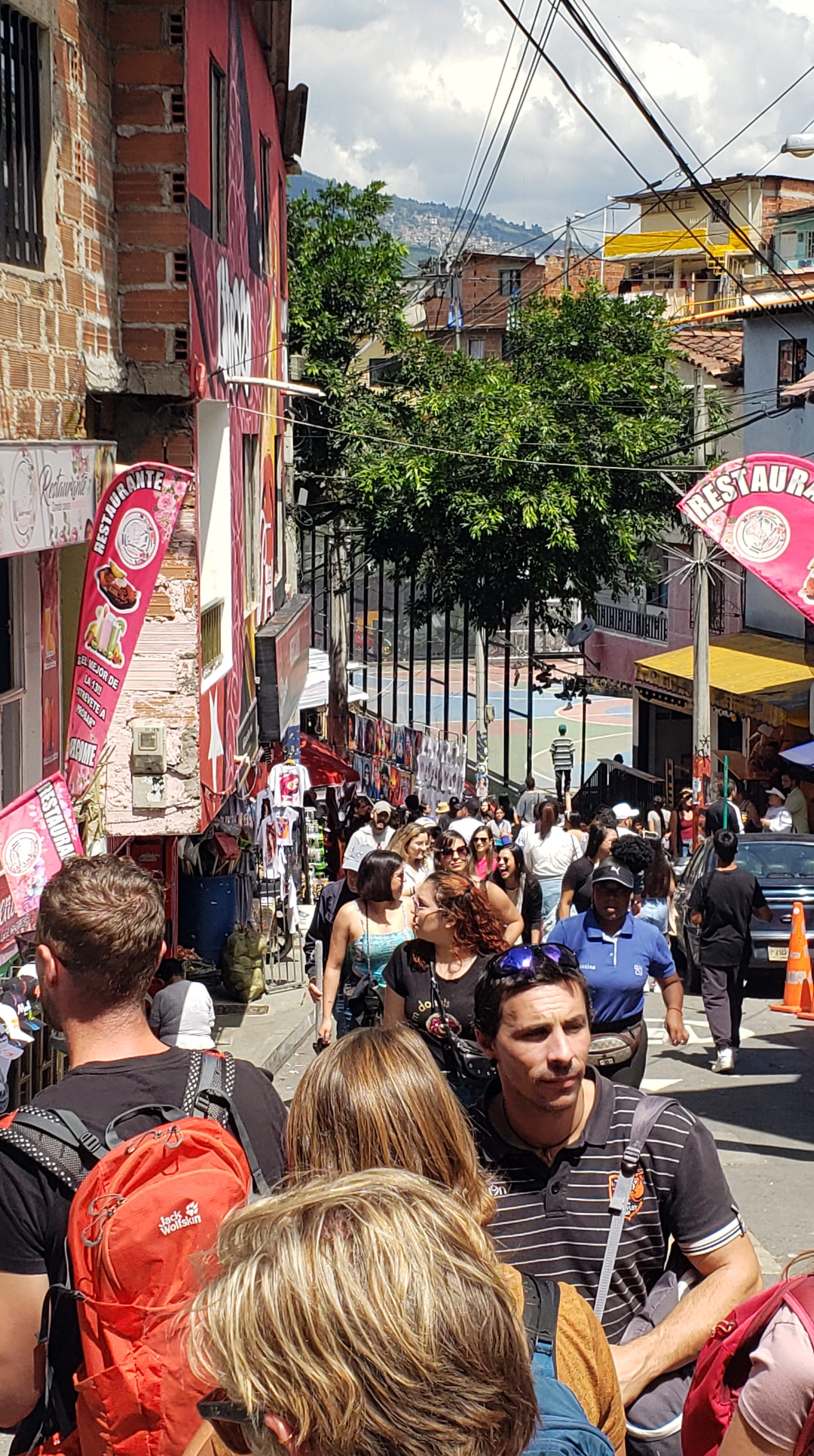 Narrow street filled with tourists