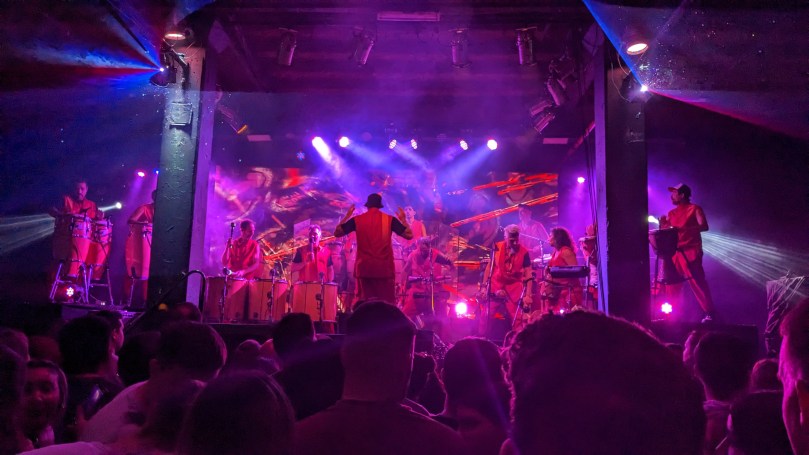 The Bomba de Tiempo band, doing their thing on stage